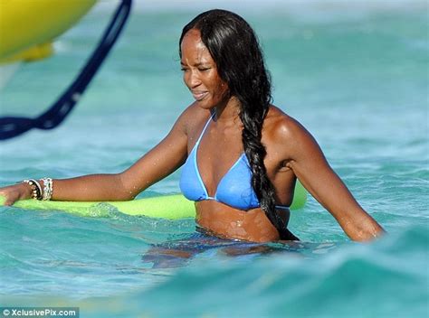 No Bald hair in sight as Naomi Campbell hits the beach | Miss Petite ...