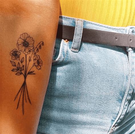 10+ Dainty Flower Tattoo Ideas - HARUNMUDAK