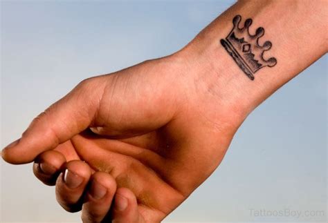 Crown Tattoo On Wrist | Tattoo Designs, Tattoo Pictures