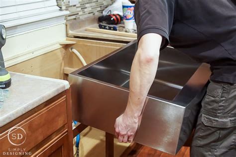 Kitchen Makeover: How to Install and Backsplash, Sink, and Cabinet