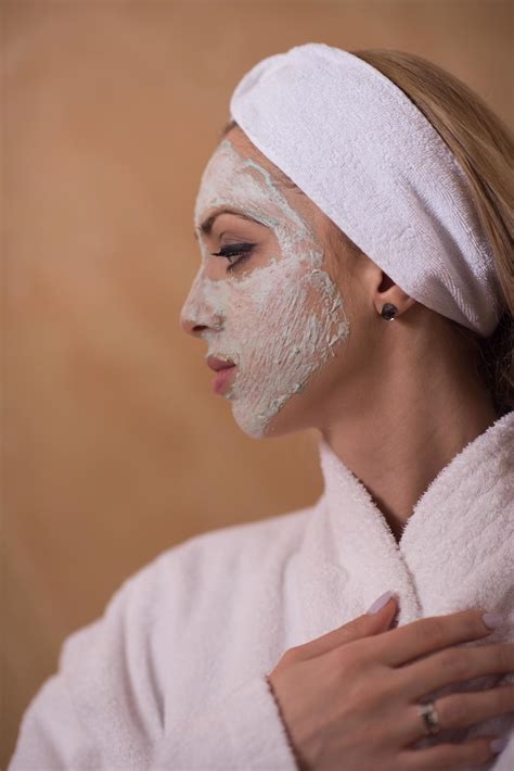 Spa Woman applying Facial Mask 12711662 Stock Photo at Vecteezy