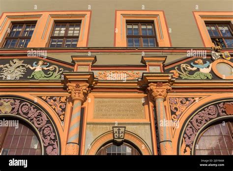 Colorful facade of a historic house on the central square of Weimar ...