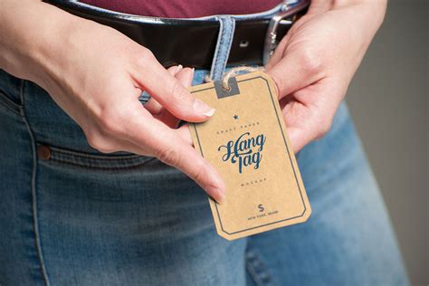 Hand Holding Kraft Paper Hang Tag Free Mockup – FreeMockup.net