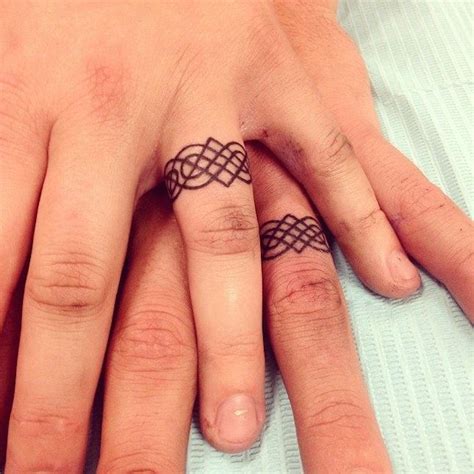 16 Wedding Ring Tattoos We Kind of LOVE | Ring tattoo designs, Wedding ...