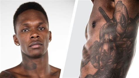 Watch UFC Fighter Israel Adesanya Shows Off His Ink | Tattoo Tour | GQ