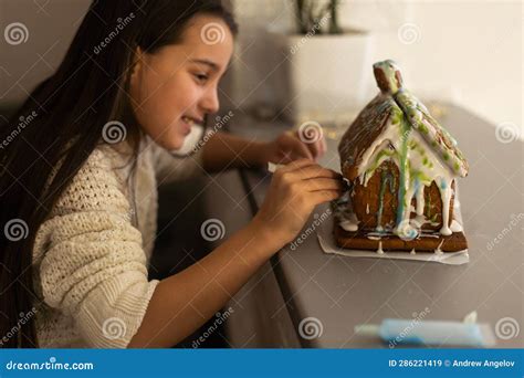 Kids Baking Christmas Gingerbread House. Children Celebrating Winter Holiday at Home. Decorated ...