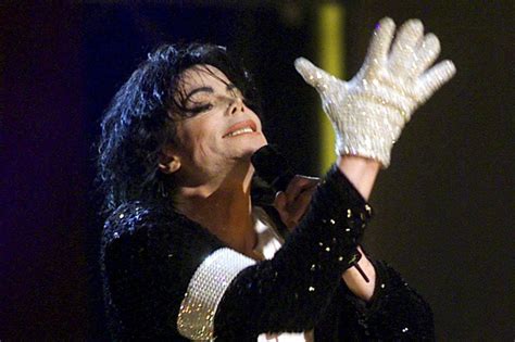 Michael Jackson’s famous white glove sells for more than £85,000 at ...