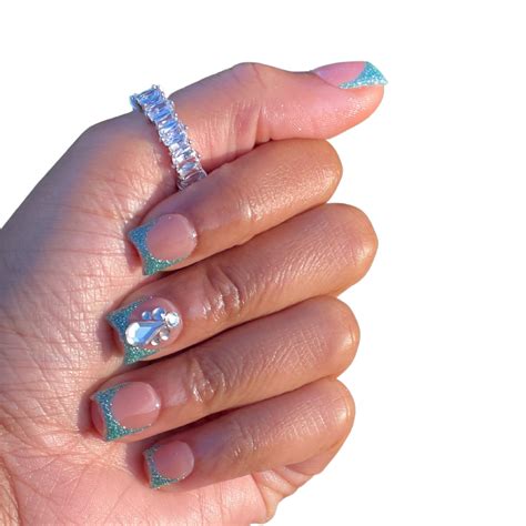 Dazzling aqua blue reflective glitter french tips! This set is 100% hand-made, painted and made ...