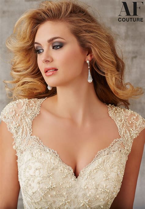 Bridal Dress, Metallic Embroidered Appliques, Beading on Lace,Ruffles. Cap Sleeves and open Back ...