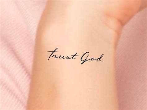 in god i trust wrist tattoo - alexanderthegreatpaintings