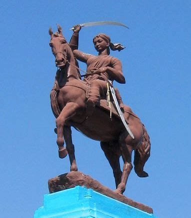 Equestrian statue of Jhansi Ki Rani (the Rani of Jhansi) in a park ...