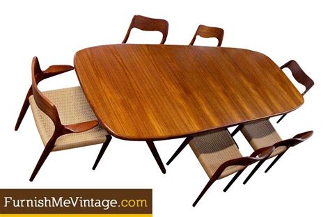 Long oval mid century modern Danish teak dining table