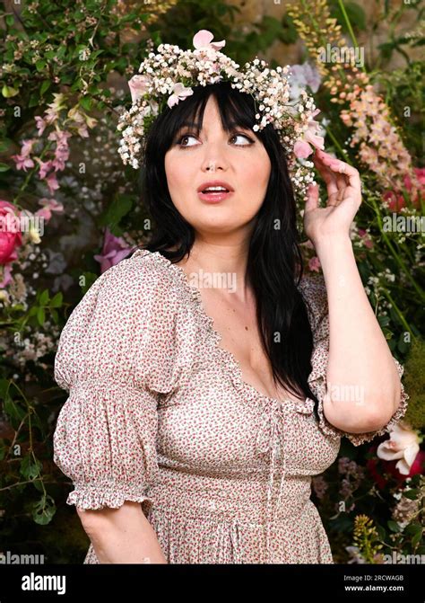 EDITORIAL USE ONLY Daisy Lowe models a flower crown ahead of her hosting Three UK's bespoke pop ...