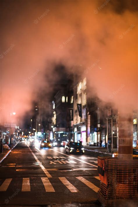 Premium Photo | View of busy night road in smoke