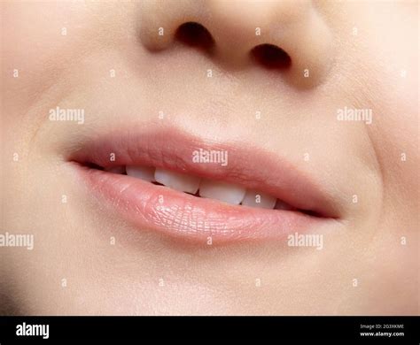 Human mouth and nose. Closeup macro portrait of young female teenager part of face Stock Photo ...