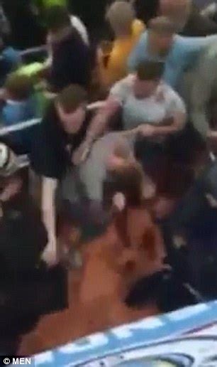 Manchester City supporters punched by Spanish police during Real Madrid ...