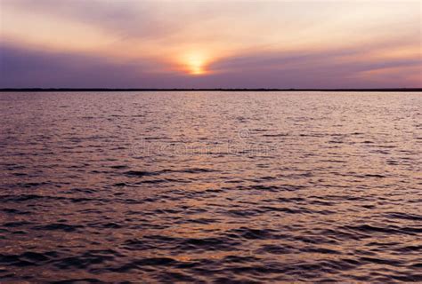 Sunset Reflection in Water, Background of the Water Surface at Sunset ...