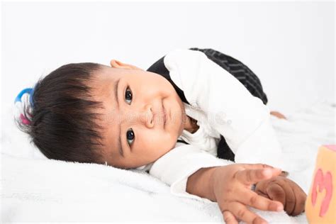 Cute little asian baby boy stock photo. Image of laying - 191869608