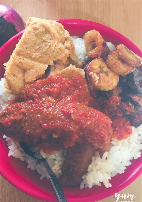 Rice and stew with fried plantains and moimoi | Food, Nigerian food, African food