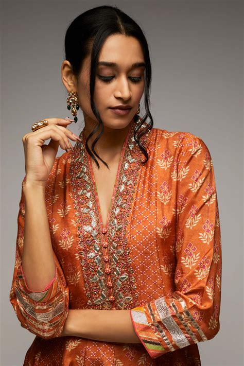 Orange kurta and dhoti | Moires