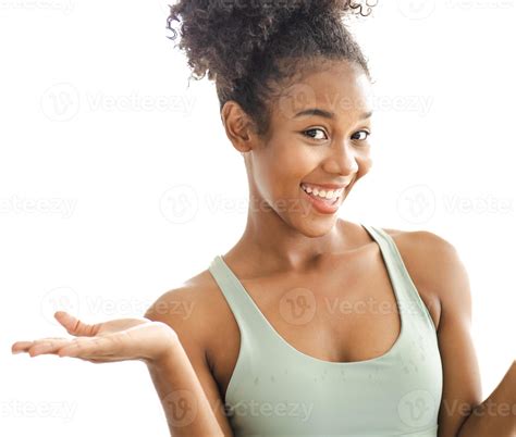 Beautiful black woman looking at camera smiling. portrait of African American woman with brown ...