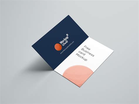 the business card is designed to look like it has an orange circle on top of it