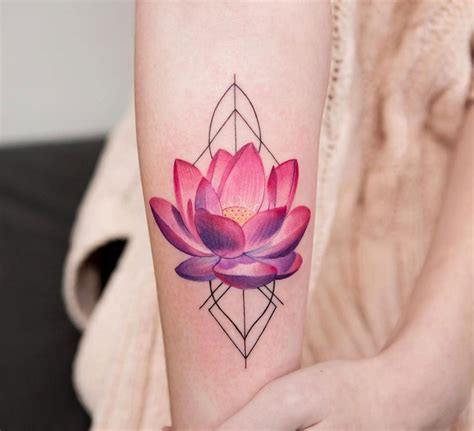 Pink lotus flower tattoo on the arm - Tattoogrid.net