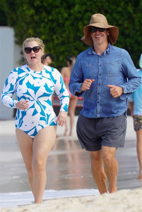 Amy Schumer, Husband Chris Fischer Visit St. Barts Beach: Photos