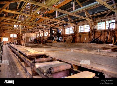 Interior of an old Lumber Mill Stock Photo - Alamy