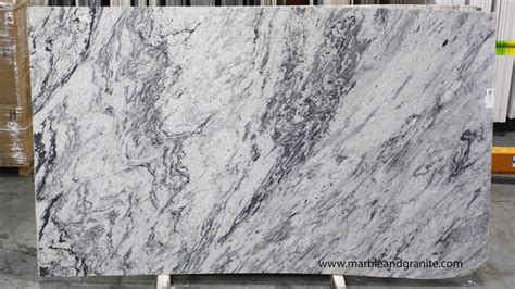 Thunder White Slabs - Marble & Granite | White granite slabs, Thunder ...