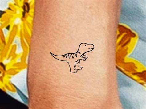 Aggregate 77+ dinosaur finger tattoos latest - in.cdgdbentre