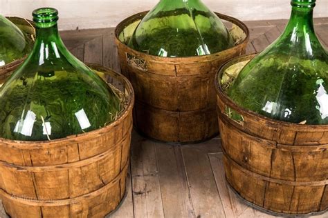 Antiques Atlas - Large Vintage Wine Bottles In Barrels