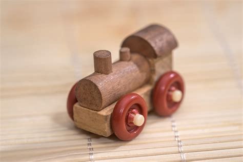 Premium Photo | Old vintage wooden toy train on wooden background