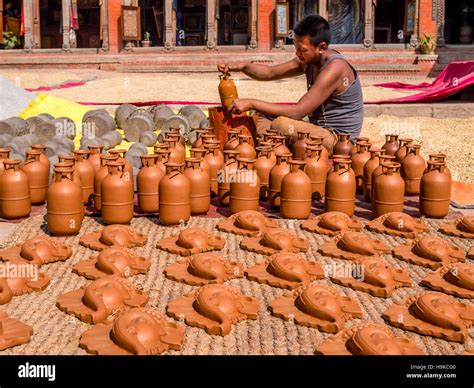 Handmade pottery in Bhaktapur's Pottery Square Stock Photo - Alamy