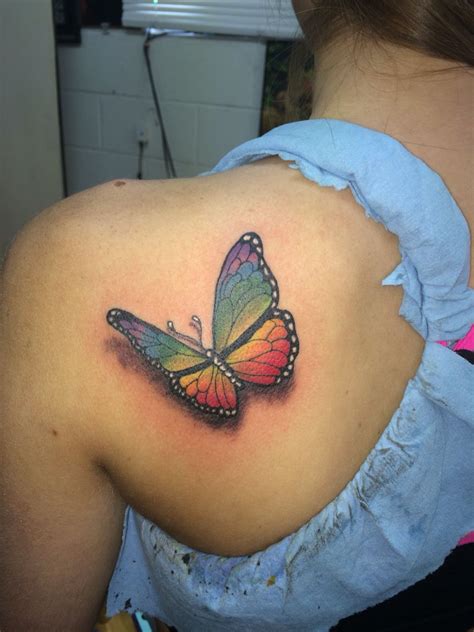 Realistic Rainbow colored butterfly tattoo done by Ricky Garza in victoria tx. Got ink? Xtreme ...