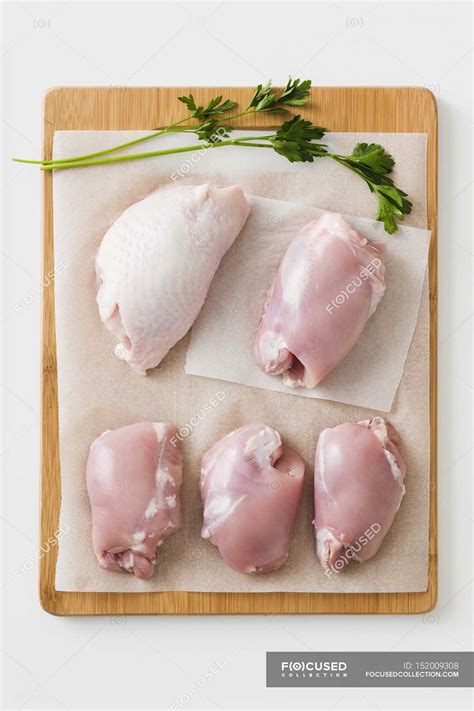 Raw Boneless chicken thighs — cookery, meal - Stock Photo | #152009308