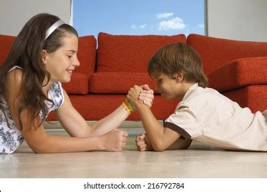 Siblings Arm Wrestling Stock Photo 216792784 | Shutterstock