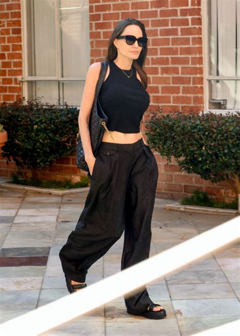 Angelina Jolie Goes Casual in Breezy Wide-Leg Trousers and a Cropped Tank - Newspaper Updates PH