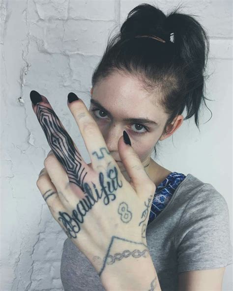 Grimes new tattoo | Tattoos, Hand tattoos, Claire boucher