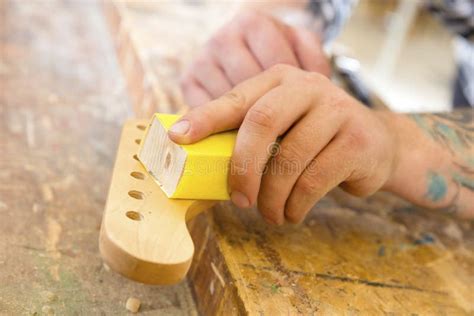 Carpenter Sanding a Guitar Neck in Wood at Workshop Stock Photo - Image of equipment, planing ...