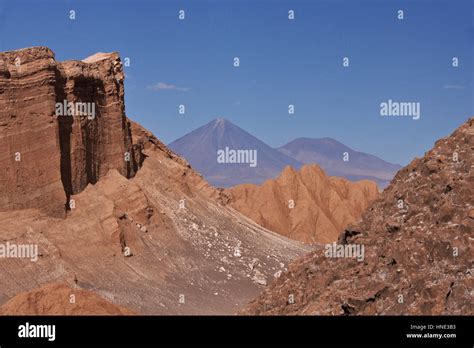 The geology of Valle de la Luna (Moon Valley) with Volcan Licancabur in background, Atacama ...