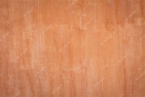 Premium Photo | Natural red clay earth wall background texture.