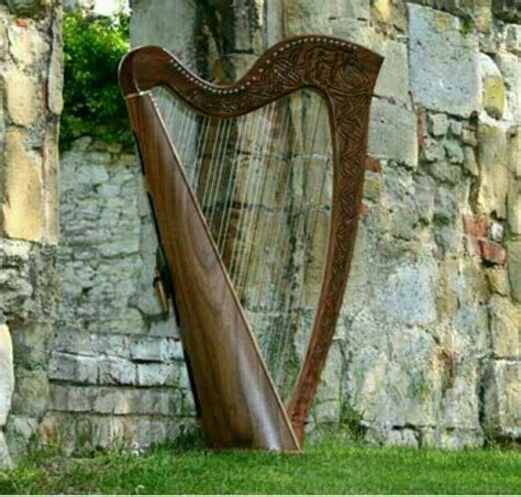 Irish Blessings: Celtic Harp on a Lush Green Field