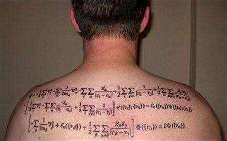 What is the hidden meaning behind this Quantum Mechanics Tattoo?