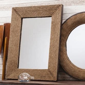 Coastal inspired mirror. A lovely deep mirror with rustic rope frame. A matching circular ...