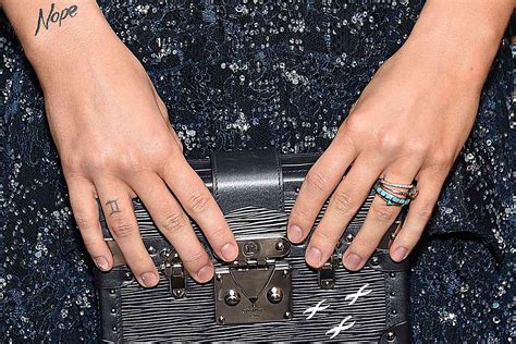 Riley Keough Wants to Laser Off Her Finger Tattoos — but Instead Covers ...