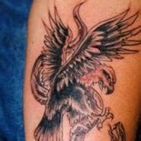 Majestic firebird tattoo on tummy - Tattooimages.biz