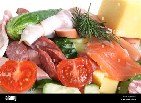 Cold cuts, fish, vegetables and cheese Stock Photo - Alamy