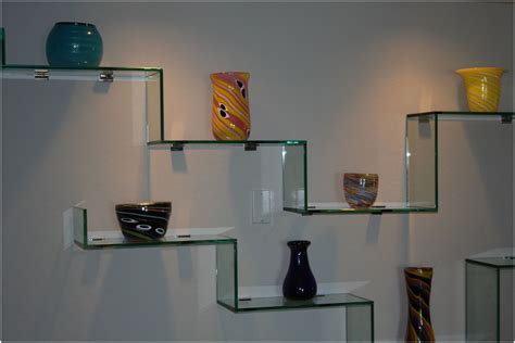 15 Collection of Wall Mounted Black Glass Shelves