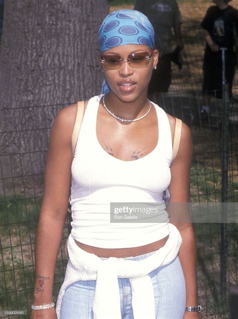 Rapper Eve attends the Ninth Annual "Kids for Kids" Celebrity... | Rapper outfits, Old school ...